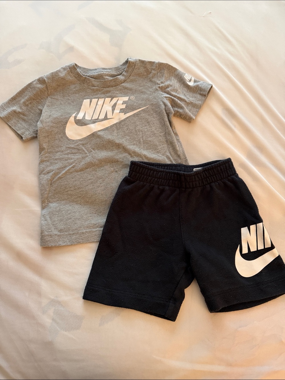 Nike Kids Black Shorts with White Swoosh